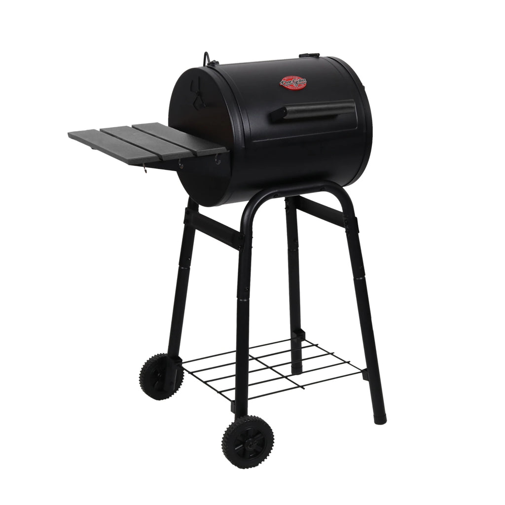 Black Patio Pro barrel-style barbecue grill on a white background. Angled to show off left side shelf and 2 wheels on the left cart legs.