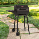 Patio Pro barrel grill on a stone paver walkway in a large, landscaped greenspace