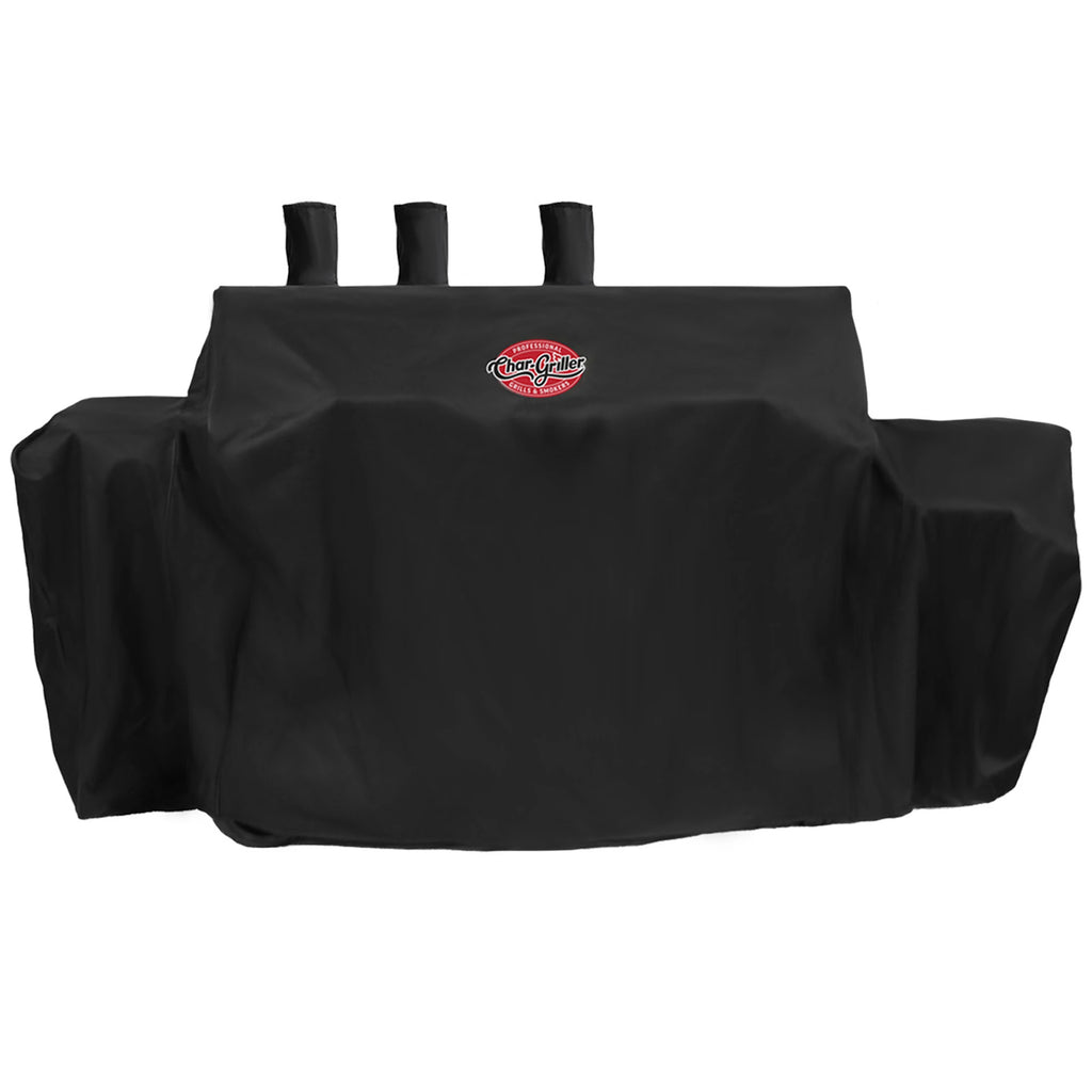 The cover installed on a barrel grill and offset smoker with 3 chimneys. Cover includes room for a side shelf on the left. The expandable side fire box cover on the right is expanded out in so the right side is wider starting about halfway down.