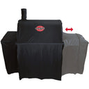 Cover installed on a Pro Deluxe grill. A semi-transparent section of the cover shows how it will cover a side fire box. A horizontal red arrow over the semi-transparent section indicates that part of the cover folds in and unfolds out