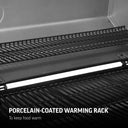 Porcelain-coated warming rack to keep food warm. Rack is attached to lid and floats several inches above main cooking grate.