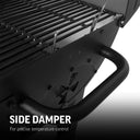 Close-up of the adjustable side damper on the charcoal side of the side firebox with text overlay that reads: Side damper for precise temperature control