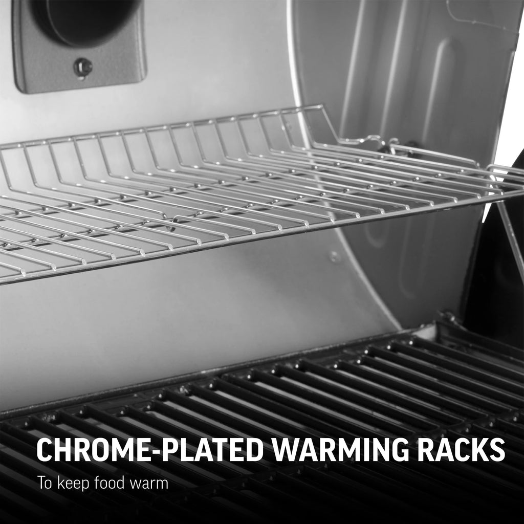 Close-up of the warming racks in the charcoal side of the grill. Text overlay reads: chrome-plated warming racks to keep food warm