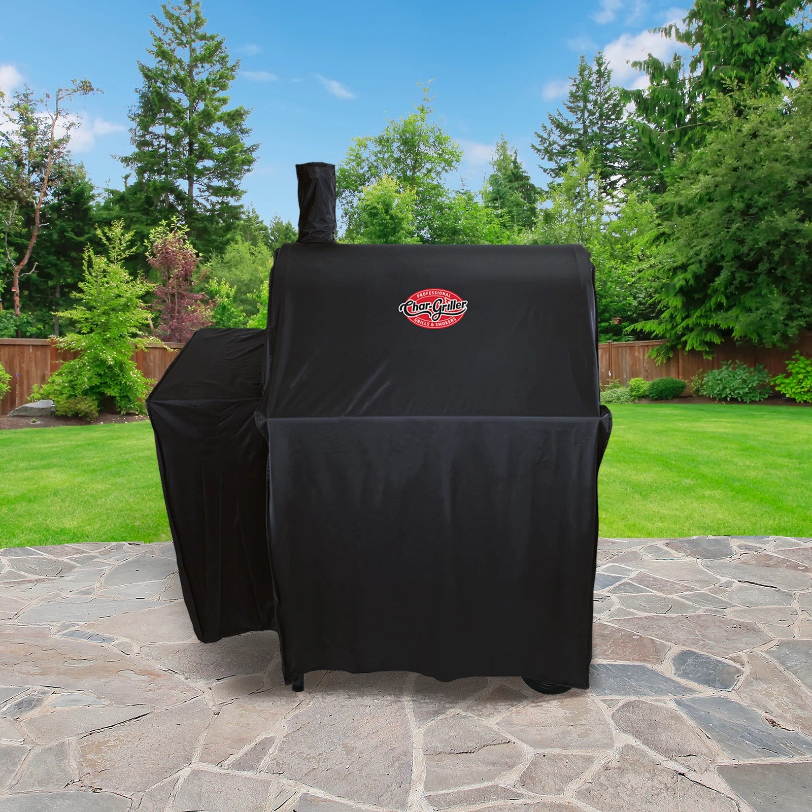 Covered Pro Deluxe grill without side fire box sitting on an outdoor patio