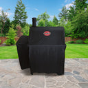 Covered Pro Deluxe grill without side fire box sitting on an outdoor patio