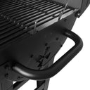Close-up of the side damper on the charcoal side of the grill. The damper is below near the bottom of the grill.