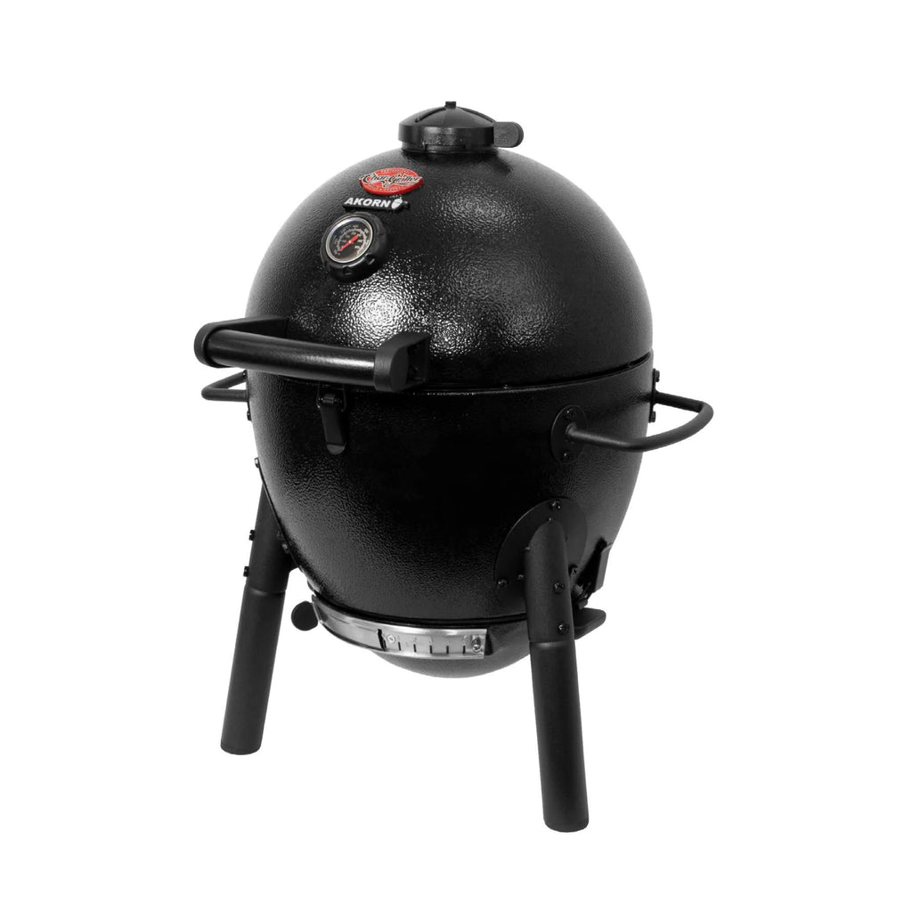 AKORN Jr. grill on a white background, angled to show the right side more. The lid has Char-Griller and AKORN logo plates centered on the front between the to adjustable damper and the built-in dome temperature gauge. A straight handle is mounted at the base of the grill dome below the temperature gauge.