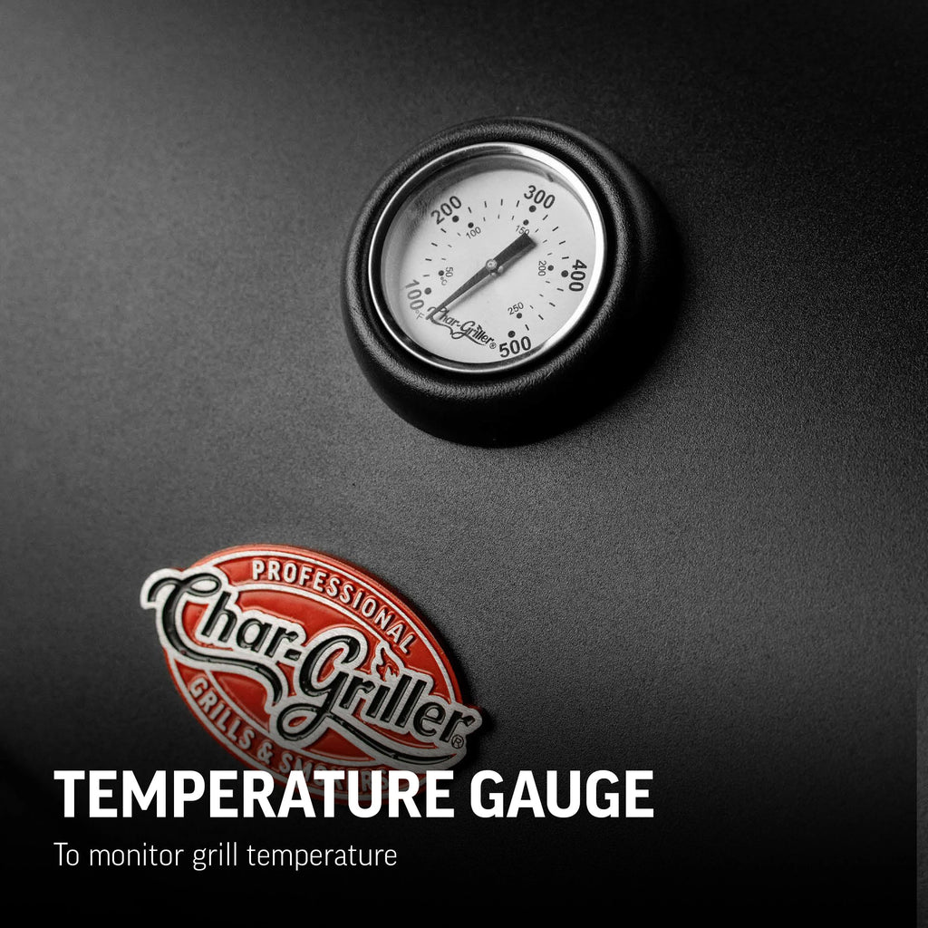 Closeup of the built-in temperature gauge in the lid of the Dakota grill. The gauge is above a Char-Griller logo plate. Text reads: Temperature gauge to monitor grill temperature.