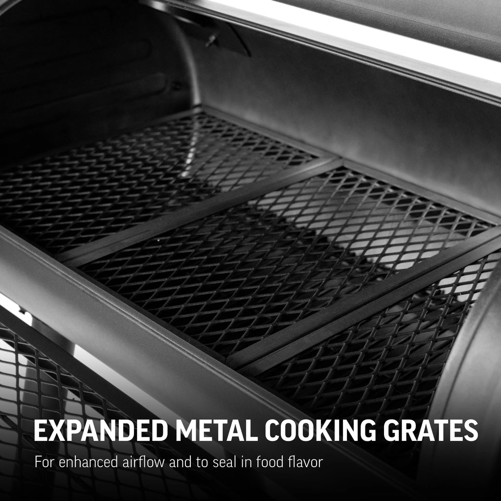 3 expanded metal cooking grates inside a Dakota grill. Text reads: Expanded metal cooking grates for enhanced airflow and to seal in food flavor. 
