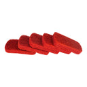 Five red scrubber pads stacked half on top of each other on a white background