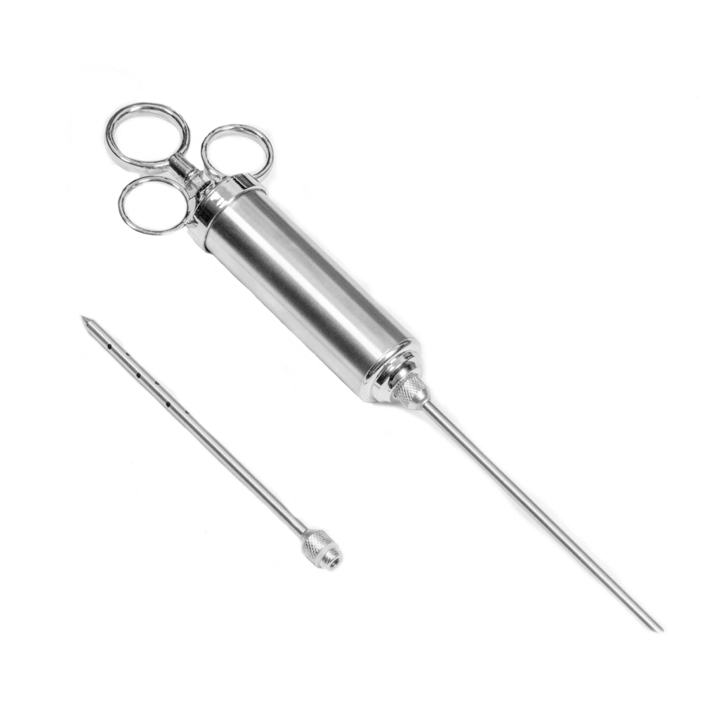 Metal syringe with the needle having one large hole at the tip attached to the syringe body. The needle multiple small holes near the tip is next to the syringe.