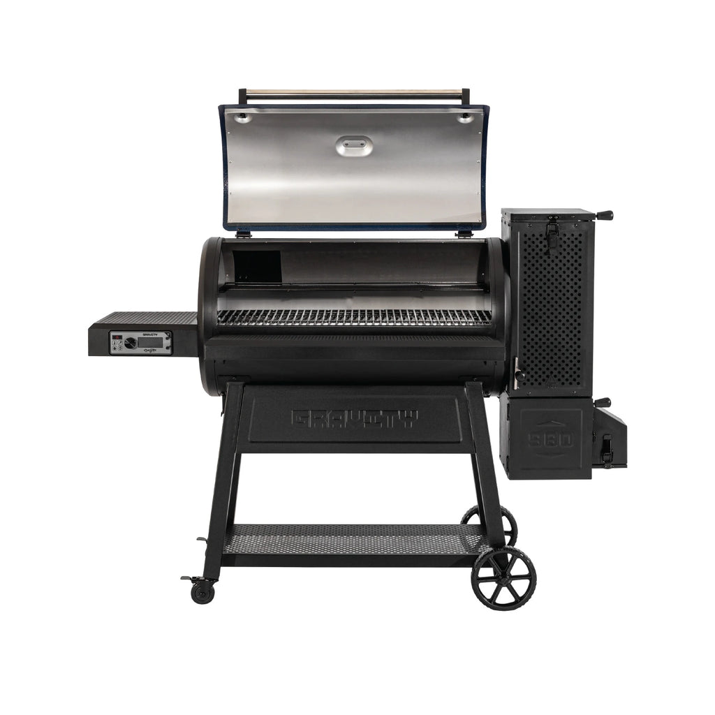 An open Gravity Fed 980 grill showing the large cooking grate and smaller warming rack above it. 