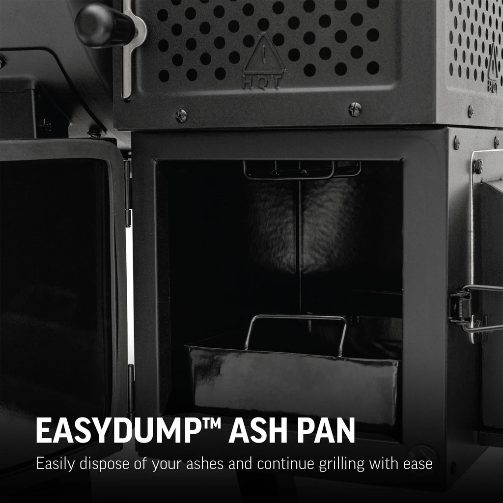Closeup of the EasyDump Ash pan in an enclosure beneath the charcoal hopper. Text overlay reads: EasyDump Ash Pan easily disposes of your ashes and continue grilling with ease.