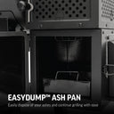 Closeup of the EasyDump Ash pan in an enclosure beneath the charcoal hopper. Text overlay reads: EasyDump Ash Pan easily disposes of your ashes and continue grilling with ease.