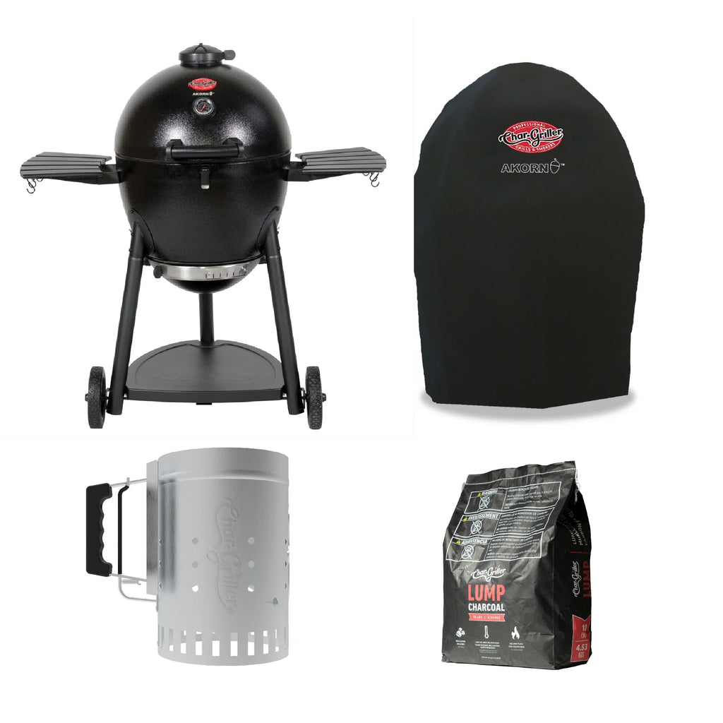 Black Char-Griller AKORN kamado grill with a matching black grill cover, a trigger-release charcoal chimney, and a bag of Lump Charcoal on a white background.