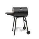 King-Griller Gambler charcoal grill with a side shelf on the left. The grill is on a cart that has a wire shelf near the bottom and two wheels on the right legs.
