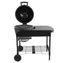 The Akorn grill mounted in the cart with the grill hood open to show the cast iron cooking grates.