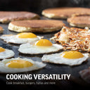 Closeup of pancakes, eggs, and hashbrowns cooking on the griddle. Text reads: Cooking Versatility. Cook breakfast, burgers, fajitas and more