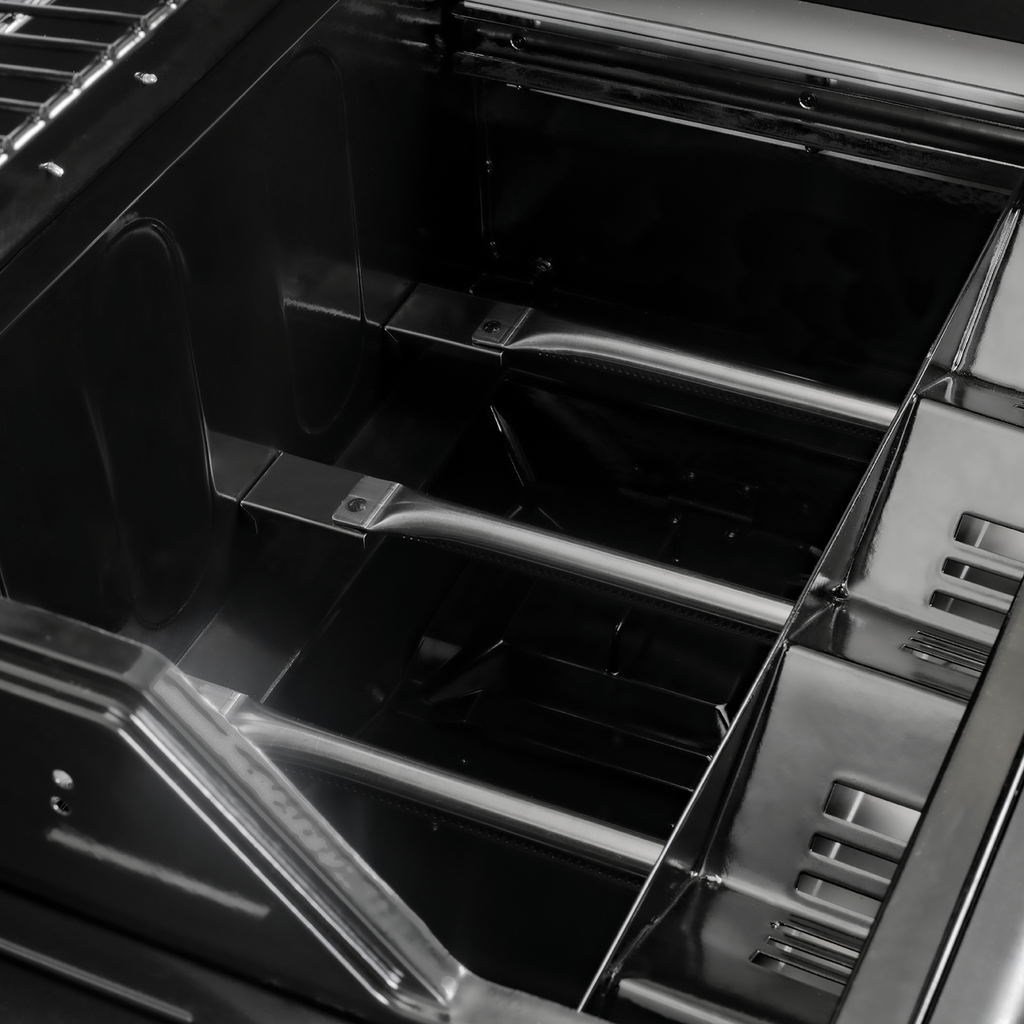 Closeup of the burner tubs under the Flavor Drawer
